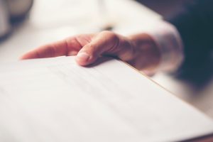 Lawyer Holding Legal Tablet Scaled